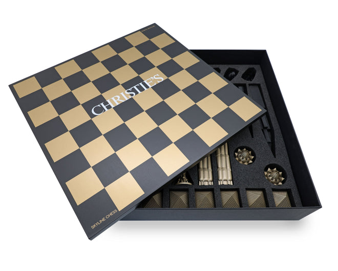 Custom Chess Sets by Skyline Chess for Henderson Christies - Metal Bronze Chess on marble board